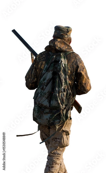 Fototapeta Hunter man in camouflage with a gun during the hunt in search of wild birds or game.