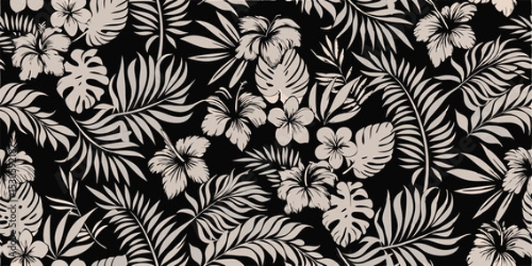 Fototapeta A dense arrangement of white tropical foliage and hibiscus flowers on a black background creates a pattern