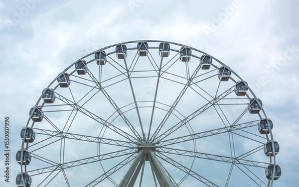 Obraz Ferris wheel on a summer day, close-up.
