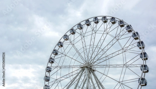 Obraz Ferris wheel on a summer day, close-up.