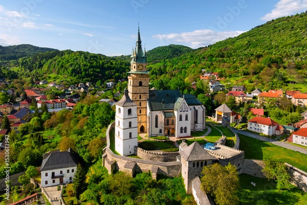 Fototapeta Aerial view of the Church of Saint Catherine of Alexandria in Kremnica, one of the former most important mining towns in Slovakia