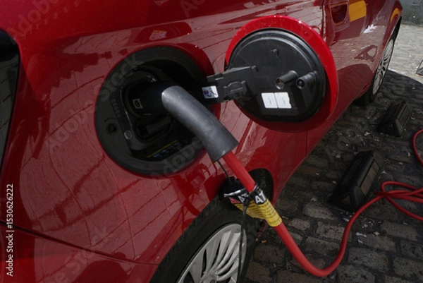 Obraz Charging an electric car