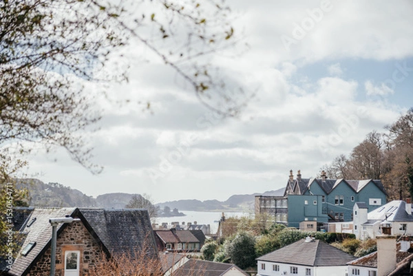 Fototapeta Oban Seaside Village with Rooftops and Bay