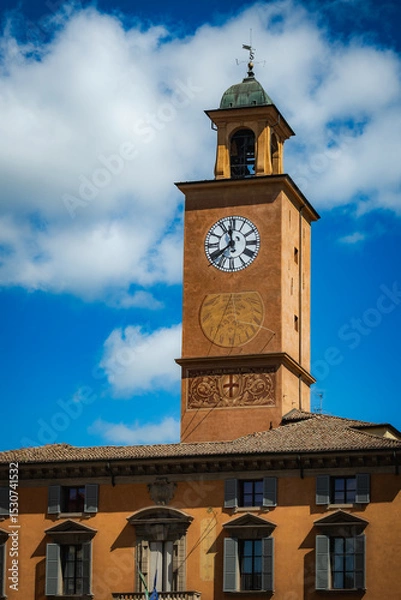 Fototapeta Clock tower with sundial and baroque details in Reggio Emilia historic center, Italy 