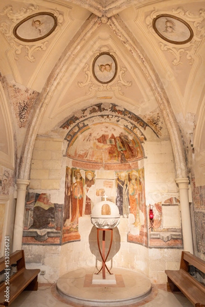 Fototapeta MATERA, ITALY - MARCH 8, 2022: The baptistery of the church Chiesa di San Pietro Caveoso with the frescoes by unknown artist of 16. cent.