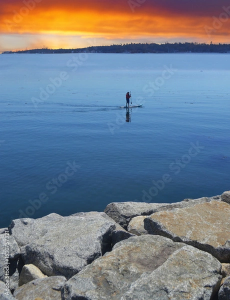 Fototapeta doing paddle board in the pacific ocean in Chile