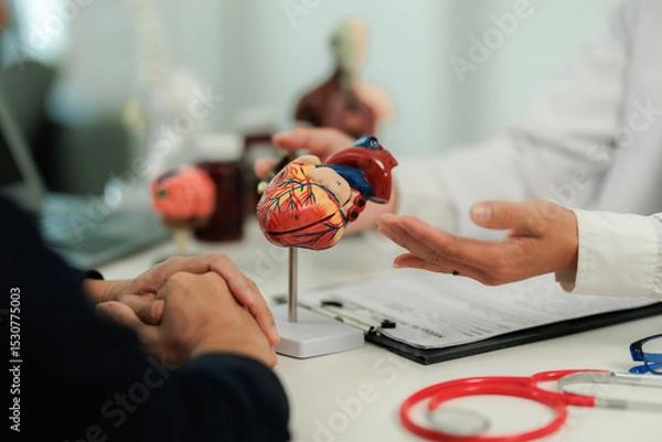 Fototapeta Patient with heart pain consulting a specialist to identify the cause and receive treatment guidance.