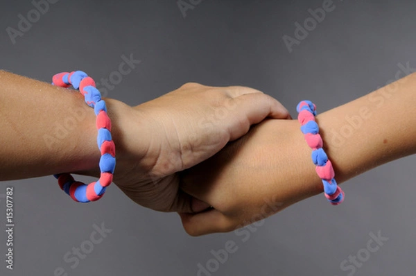 Fototapeta hands and bracelet