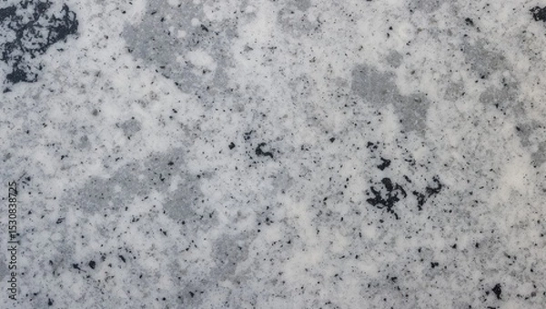 Fototapeta A detailed close-up captures the complex texture and color differences of a granite stone surface.