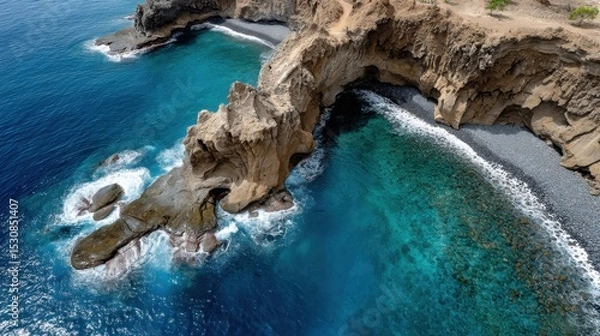 Obraz Aerial view of dramatic coastal cliffs and turquoise ocean waters