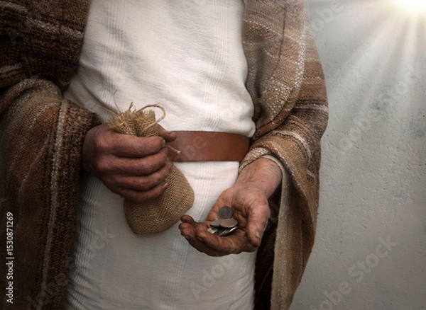 Obraz Ancient man with silver coins