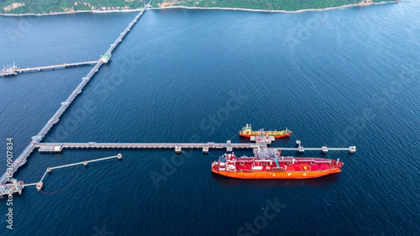Fototapeta Aerial view LPG gas tanker ship at oil and gas terminal platform, Liquefied Petroleum Gas tanker ship industrial offshore oil gas terminal tanker ship LPG tanker ship loading arm loading and unloading