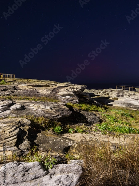 Fototapeta Rock cliff platform view at night.