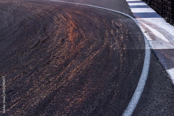 Fototapeta Car tire mark on race track, Abstract black car tire mark on race track, Abstract texture background car tire mark skid mark on asphalt circuit, Tire track on road race speed track circuit.