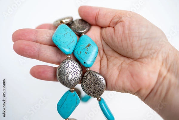 Obraz Artisan-made turquoise, howlite necklace with rustic charm, Fashion accessory, vibrant turquoise and silver necklace, showcasing unique ethnic-inspired design