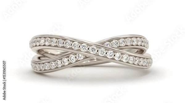 Fototapeta Close-up view of a luxurious silver ring adorned with numerous sparkling white diamonds arranged in an intertwining design. The ring rests against a clean white backdrop.