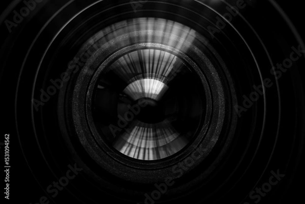 Fototapeta Close up of modern digital camera lense, a view of the front lens with flare effects