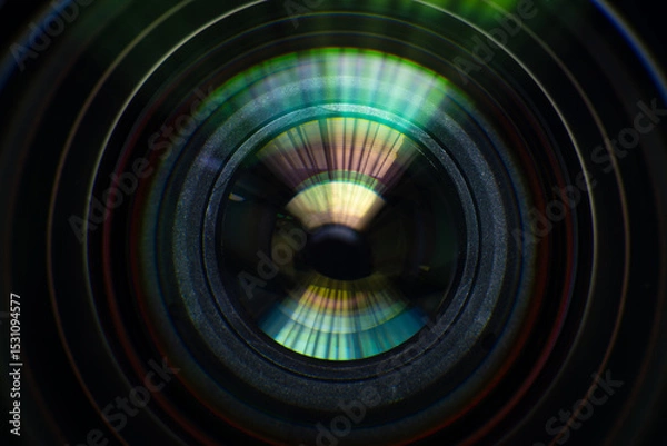 Fototapeta Close up of modern digital camera lense, a view of the front lens with flare effects