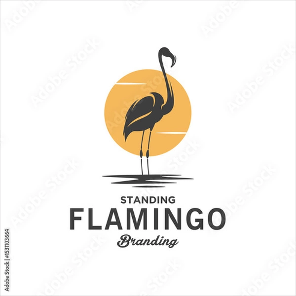 Obraz Silhouette Standing Flamingo Bird In A Pool Of Water With Sunset In The Background Logo Design