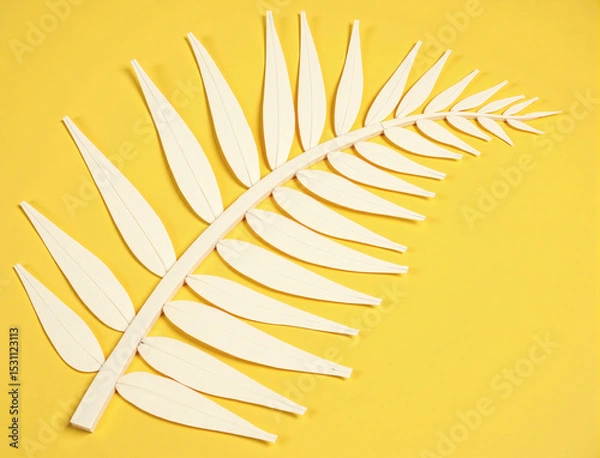 Fototapeta Minimal Paper Palm Leaf on Yellow Background