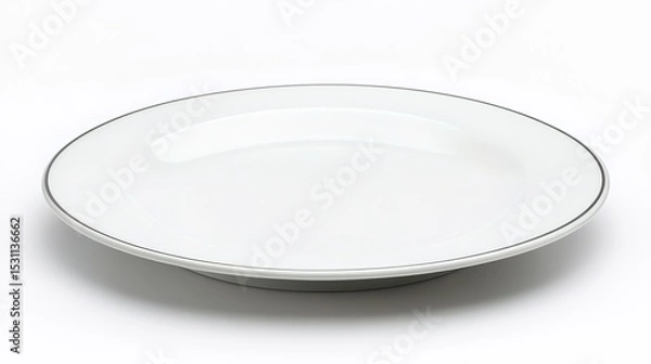 Fototapeta A simple white ceramic plate with a thin silver rim, shown against a plain white background.
