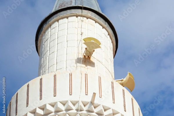 Obraz Minaret with attached loudspeakers used for call to prayer. Traditional Islamic religious building element