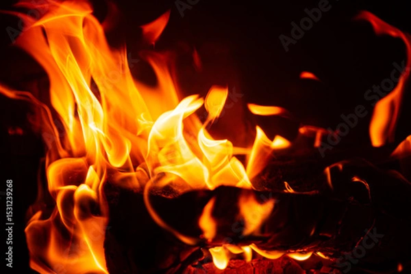 Obraz Bright flames dance chaotically, illuminating the darkness with warm hues