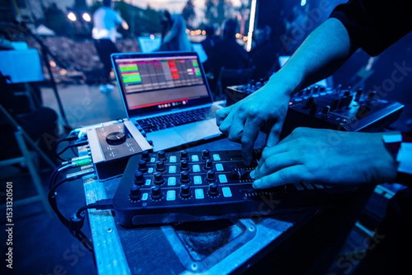 Obraz DJ or Sound Engineer Working on a Console