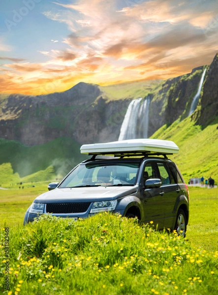 Fototapeta Magical landscape with a car on the background of a waterfall Seljalandsfoss in Iceland. Exotic countries. Amazing places. Popular tourist atraction.