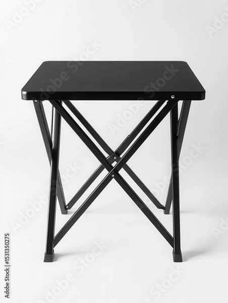 Obraz A black folding table with a white background