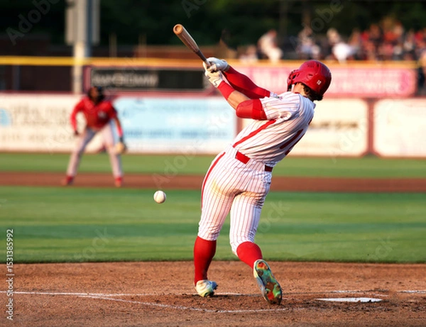 Obraz baseball hitting a ball off the bat