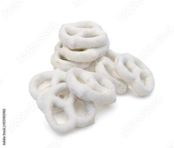 Obraz White chocolate covered pretzels on white background 