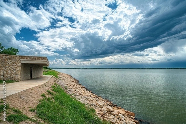 Fototapeta Dam United States. Closeup of Sardis Lake Dam with Cloudy Sky in Oklahoma