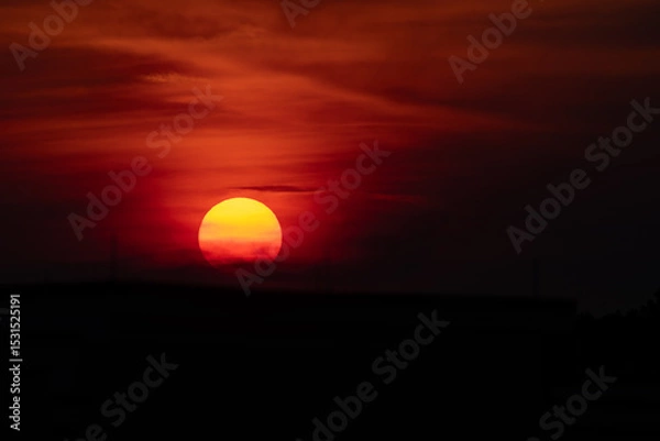 Fototapeta Gorgeous red and orange sunset with copy space