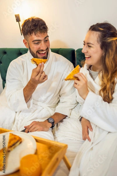 Fototapeta Couple Eating Toast in Bed