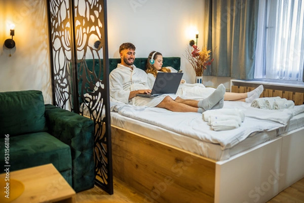 Fototapeta Modern Couple in Bed – Separate Digital Worlds, Shared Space