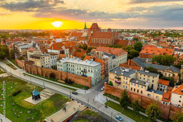 Obraz Aerial panoramic view of historical buildings and roofs in Polish medieval town Torun