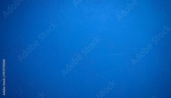 Fototapeta An abstract view of textured blue paint on a wall with visible brush strokes and uneven surface.