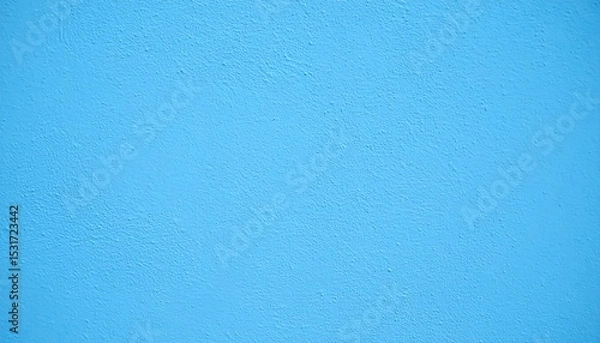Fototapeta Light blue painted wall featuring a textured surface creates a calming and minimalist backdrop.