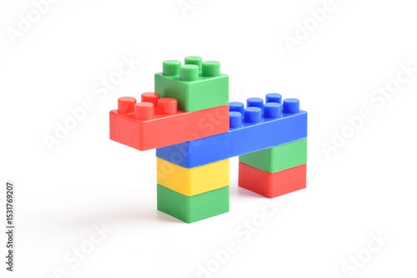 Obraz Plastic building blocks dog on a white background