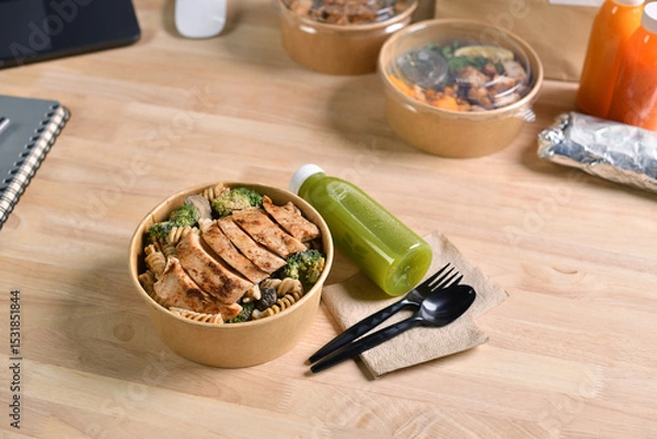 Fototapeta Having a lunch break at the office with delicious Healthy food delivery in take away boxes, Healthy eating concept.