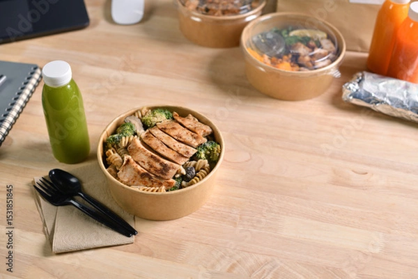 Fototapeta Having a lunch break at the office with delicious Healthy food delivery in take away boxes, Healthy eating concept.