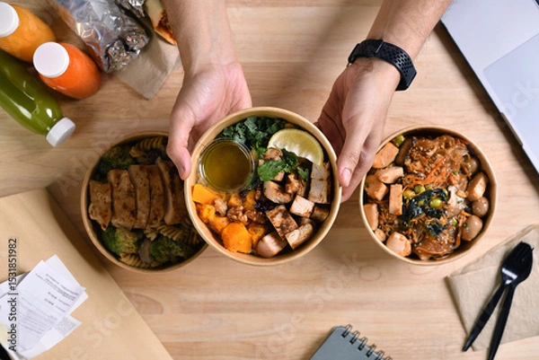 Fototapeta Having a lunch break at the office with delicious Healthy food delivery in take away boxes, Healthy eating concept.