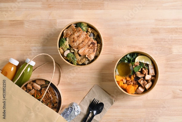 Fototapeta Having a lunch break at the office with delicious Healthy food delivery in take away boxes, Healthy eating concept.