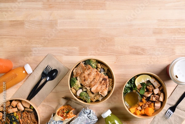 Fototapeta Having a lunch break at the office with delicious Healthy food delivery in take away boxes, Healthy eating concept.