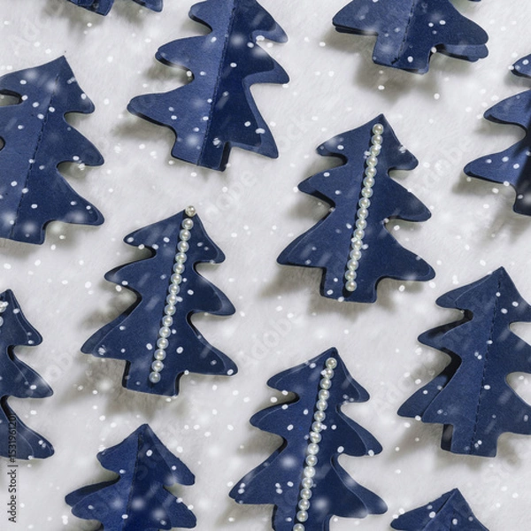 Obraz Trend square pattern from blue Christmas trees cut out of craft paper, happy holidays concept. Diy blue tree firs decorated snowflakes and pearls. Minimal greetings card, Creative top view