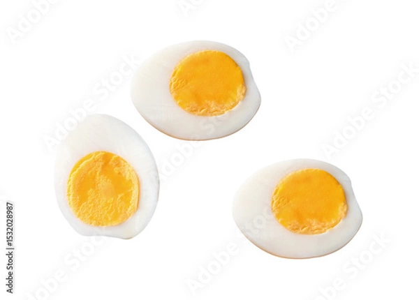 Fototapeta Top view set of cooked or boiled chicken eggs with egg yolk in three halves isolated with clipping path in png file format