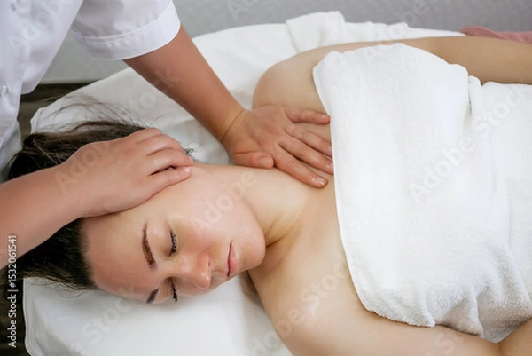 Obraz Buccal Massage Technique Performed by Professional Therapist – Natural Facial Sculpting and Anti-Aging Procedure at Spa