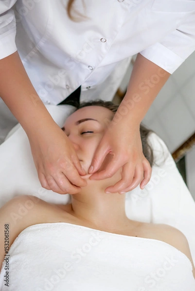 Obraz Buccal Massage Technique Performed by Professional Therapist – Natural Facial Sculpting and Anti-Aging Procedure at Spa