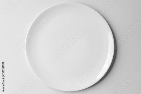 Fototapeta empty white ceramic plate  isolated on white background with clipping path.